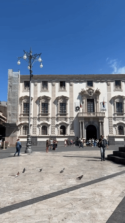 Sunny day draws crowds to Catania's historic Piazza del Duomo