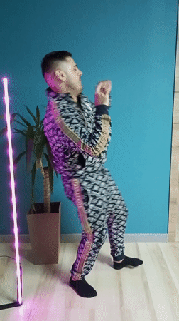 Man engages in playful indoor activities in Pervomaysky home