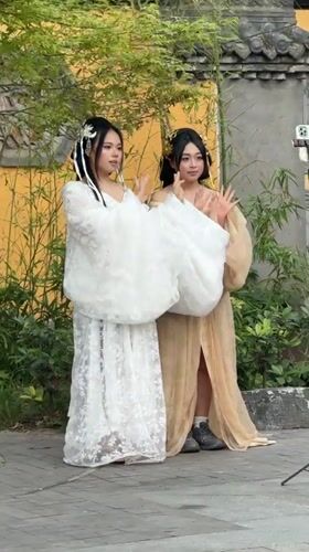Traditional dress photography session observed in Yuzhong District plaza