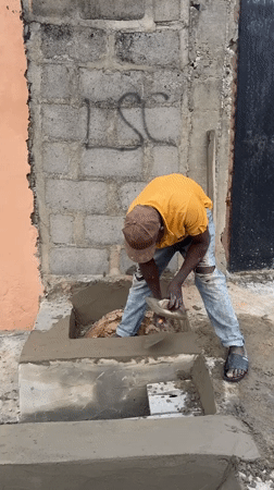 Construction worker builds concrete structures in Ado Nigeria