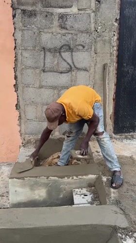 Construction worker builds concrete structures in Ado Nigeria