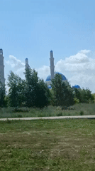 Hazrat Sultan Mosque observed from vehicle in Astana