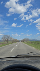 Driver travels rural highway near Zimnitsa, Bulgaria