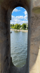 Tourist captures Berlin landmarks during midday walking tour
