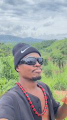 Man in Nike beanie spotted outdoors in Achara, Nigeria