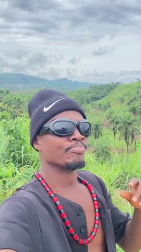 Man in Nike beanie spotted outdoors in Achara, Nigeria