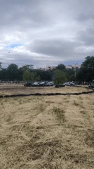 Demolition derby and car stunts entertain spectators at dirt track