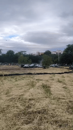 Demolition derby and car stunts entertain spectators at dirt track