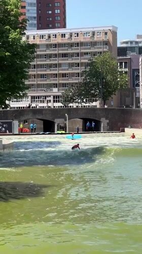 Surfing the city wave pool and touring Rotterdam's Markthal