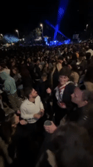 Outdoor concert draws dancing crowds in Sevilla evening