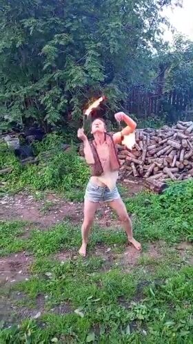 Backyard afternoon in Ostrovtsy: cats, fire-spinning, and kids at play