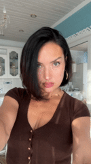 Woman records selfies in mirror in Пастухово, Russia