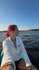 Paddleboarding on calm water near Chaikovsky, Russia