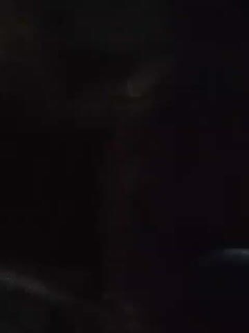 The video is extremely dark, making it difficult to discern details. Intermittent shadows or dark shapes suggest potential objects or movement, but without sufficient illumination, a definitive description is impossible. The primary characteristic of the video is its overwhelming darkness.