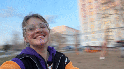 Woman enjoys spinning playground ride in Russian city