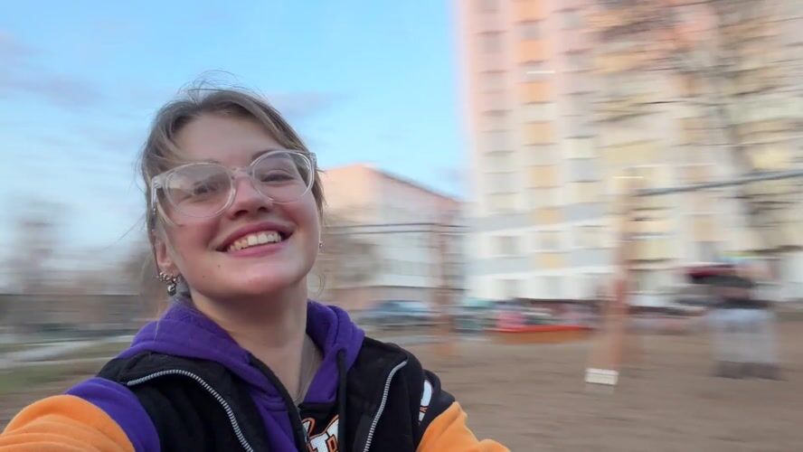 Woman enjoys spinning playground ride in Russian city