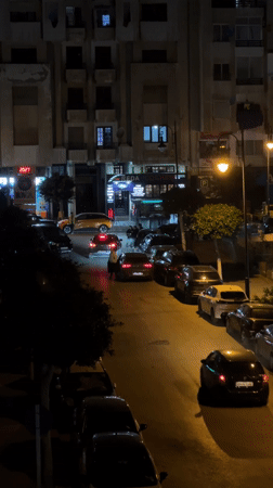 Evening scenes capture tourist activity and street life in Tangier