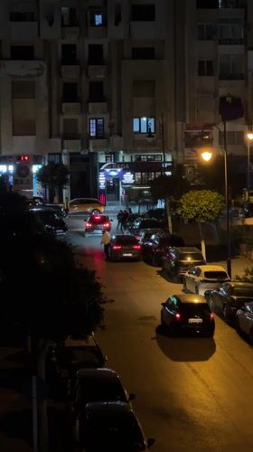 Evening scenes capture tourist activity and street life in Tangier