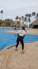 Team dancers perform poolside at Venezuelan beach resort