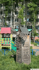 Residential playground with windmill documented in Chaikovsky, Russia