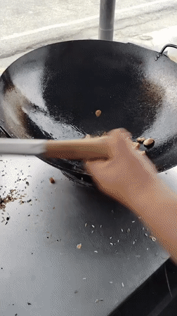 Evening cooking and street scenes documented in Tinaquillo, Venezuela