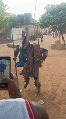 Traditional masquerade performer draws crowd in Akwanga, Nigeria