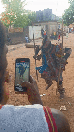 Traditional masquerade performer draws crowd in Akwanga, Nigeria