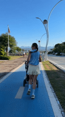 Jogging with a stroller along Fethiye's blue bike path