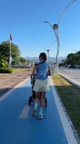 Jogging with a stroller along Fethiye's blue bike path