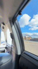Backseat snapshots from a moving car near Докша