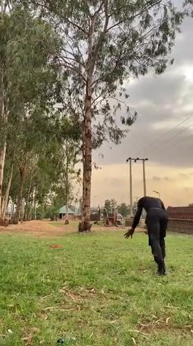 Young men perform acrobatics and dance routines in Vom, Nigeria