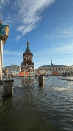 Sunny afternoon at a fountain square in Rusanovo, Russia