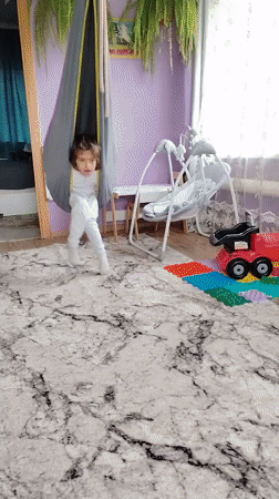 Mother and child spend early morning hours at home