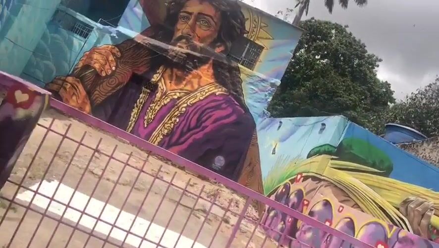 Street murals featuring religious imagery documented in La Asuncion
