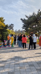 Street performance draws morning crowd in Ulsan, South Korea
