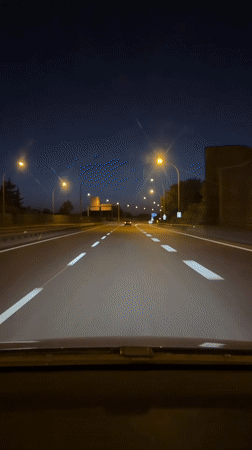 Nighttime highway drive through Luxembourg near Mondercange