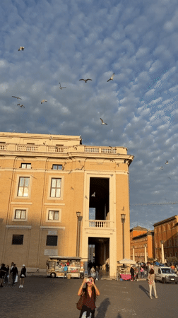 Evening activity captured in historic Roman piazza near Vatican
