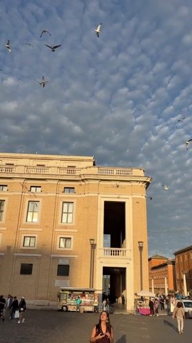 Evening activity captured in historic Roman piazza near Vatican