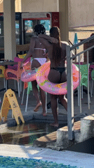Lazy afternoon at the pool with inflatables and sunshine