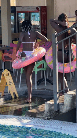 Lazy afternoon at the pool with inflatables and sunshine