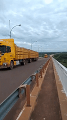 Cargo barge and truck traffic observed near Concepción, Paraguay