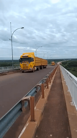 Cargo barge and truck traffic observed near Concepción, Paraguay