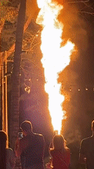 Fire performers entertain beach crowds in Kamala, Thailand