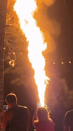 Fire performers entertain beach crowds in Kamala, Thailand