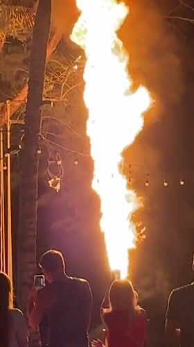 Fire performers entertain beach crowds in Kamala, Thailand