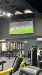 Gym facility documented with interior and weightlifting equipment footage