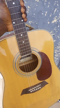 Acoustic guitar up close in Serti, Nigeria
