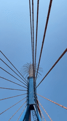 Blue tower structure documented under clear skies in Đà Nẵng