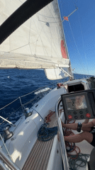 Sailing the Adriatic off Montenegro, cruise ship in view
