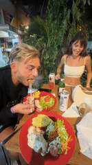 Tourists dine and socialize at North Kuta restaurants